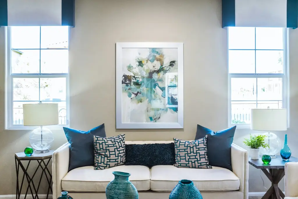 Smooth light wall behind a sofa